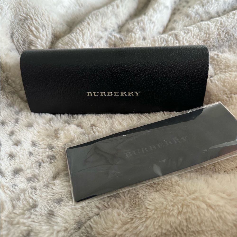 Burberry black eyeglass case and in package dust cloth